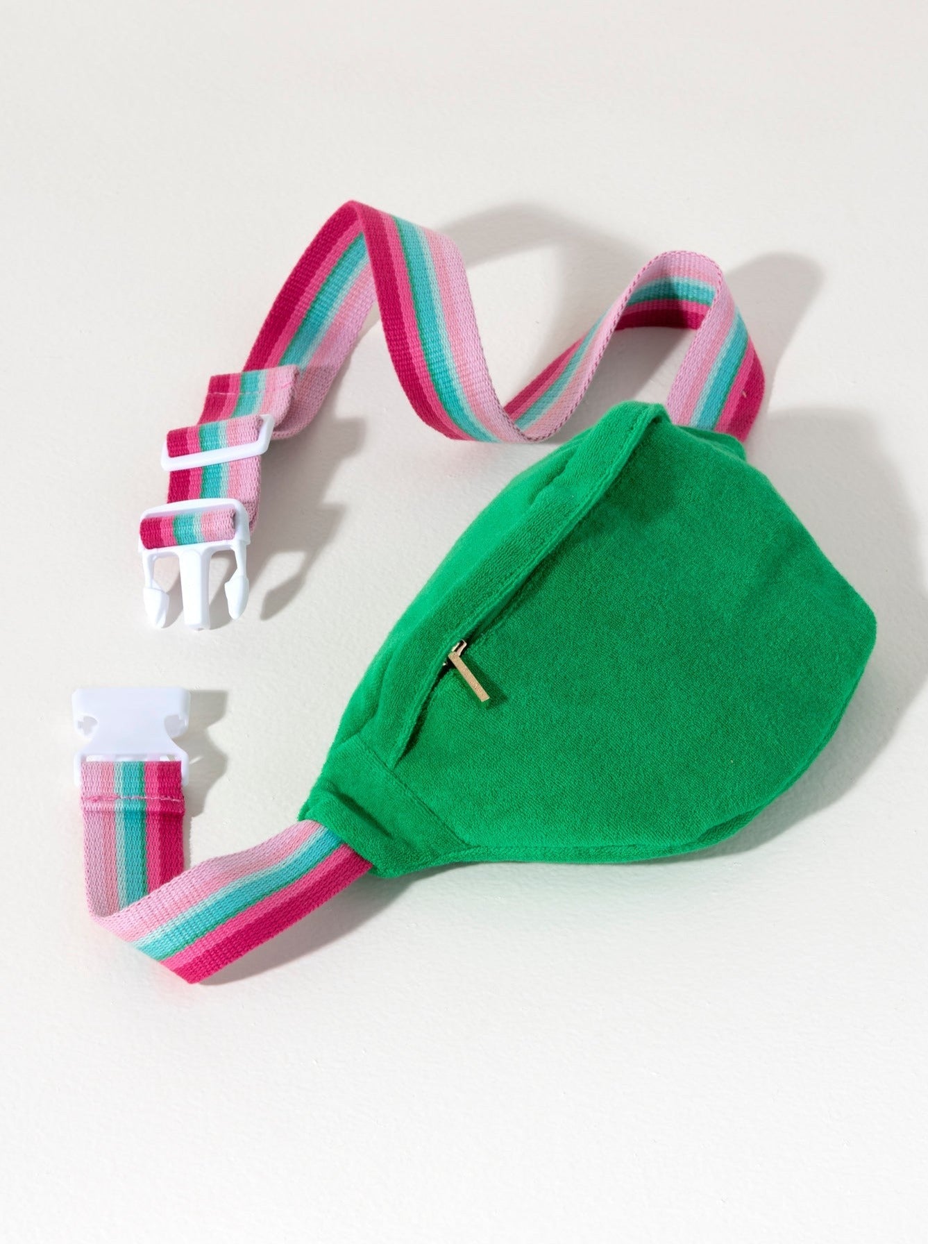 Never leave the house without this summer staple: Shiraleah's Sol Belt Bag. Made from soft and absorbant cotton terry, the bag is spacious and soft enough to carry all your essentials on everyday adventures. Its adjustable belt strap can be worn on the waist or across the body - depending on your vibe. Pair with other items from Shiraleah's Poolside collection to complete your look!