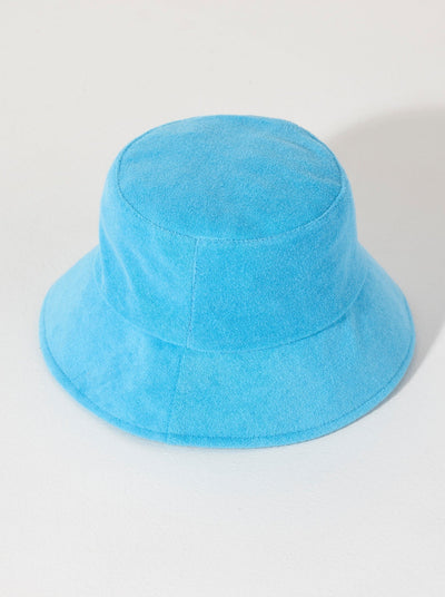 Keep your head cool and dry this summer with Shiraleah's Sol Bucket Hat. Made from soft and absorbent cotton terry, this hat is the perfect poolside companion. Its bright turquoise color matches the rest of Shiraleah's Sol collection. Pair with other items to complete your look!
