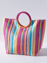 Bring some brightness to the beach with you this summer in Shiraleah's roomy and colorful Mallorca Tote. Made from paper straw and featuring sleek circular handles, this lightweight bag is perfect for carrying all your essentials in the warm weather. Pair with the Mallorca Zip Pouch and other Shiraleah items to complete your look!