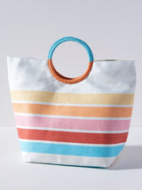 Bring some brightness to the beach with you this summer in Shiraleah's roomy and colorful Ibiza Tote. Made from paper straw and featuring sleek circular handles, this lightweight bag is perfect for carrying all your essentials in the warm weather. Pair with the Ibiza Zip Pouch and other Shiraleah items to complete your look!