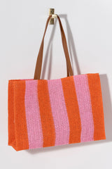 Bring some brightness to the beach with you this summer in Shiraleah's roomy and colorful striped Filomena Tote. Made from paper straw and featuring sleek circular handles, this lightweight bag is perfect for carrying all your essentials in the warm weather. Pair with the Filomena Zip Pouch and other Shiraleah items to complete your look!