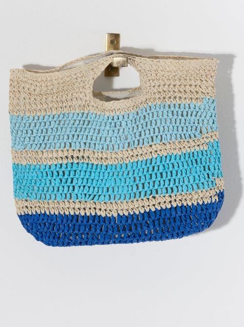 Add a pop of color to your summertime outfits with Shiraleah's Carmend Top Handle Bag. Made from woven paper strap with chic cutout handles and a striped design, this handbag will fit your needs from a night out to a day on the beach. Pair with other Shiraleah items to complete your look!
