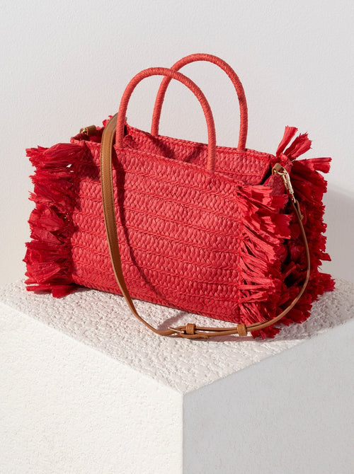Make your outfit pop with Shiraleah's Sarah Mini Tote handbag. Made from woven paper straw in a bright red color, this bag is the perfect accessory to bring on a picnic or for a night out! Featuring chic circular top handles, the detachable, adjustable cross-body strap allows for versatility in your style. Pair with other items from Shiraleah to complete your look!
