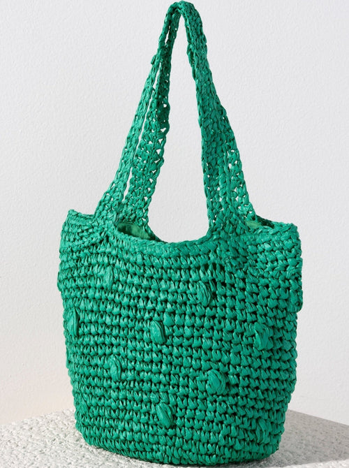 Carry your essentials in style this summer with Shiraleah's Sam Tote. Made from woven paper straw with two sturdy handles, this trendy tote bag is both practical and stylish. The deep green design adds a classic color pop to any summer outfit. Pair with other items from Shiraleah to complete your look!
