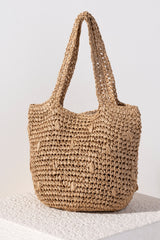 Carry your essentials in style this summer with Shiraleah's Sam Tote. Made from woven paper straw with two sturdy handles, this trendy tote bag is both practical and stylish. The natural straw color adds a chic sophistication to any summer outfit. Pair with other items from Shiraleah to complete your look!
