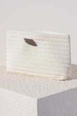 Stand out from the crowd this summer with Shiraleah's Josie Clutch. Made from intricately embroidered glass beads with a chic cutout top handle, this handbag is our trendiest accessory yet. The elegant white color scheme will tie together all your favorite summertime outfits. Pair with other items from Shiraleah to complete your look!
