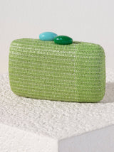 Spice up your summer wardrobe with Shiraleah's Scala Minaudiere. With a bright green body and both dark and light green top clasps, this purse adds a pop of color to every outfit. You can carry it as a clutch, or use the detachable cross-body chain to add some versatility to your style. Pair with other items from Shiraleah to complete your look!
