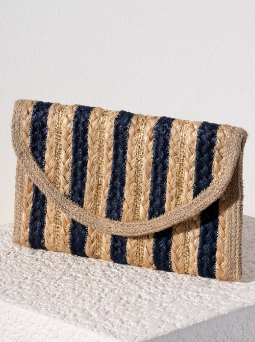 Give your style a classic touch with Shiraleah's Port Tote. Made from woven jute with a chic blue striped pattern, the sleek envelope shape makes this bag the perfect clutch. Pair with other items from Shiraleah's American Summer collection to complete your look!
