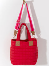 Perfect your on-the-go lifestyle with Shiraleah’s Ezra Tote. This roomy tote features a sleek quilted texture with both double handles and a detachable, adjustable cross-body strap. Featuring plenty of inner room and pockets, you can carry everything in one place with this bag. Pair with other items from Shiraleah's Ezra collection to complete your look!
