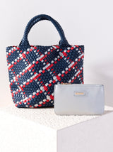 Give your handbag collection a sleek update with Shiraleah's Blythe Plaid Mini Tote. This sophisticated bag is made from woven vegan leather and features a trendy plaid design. Its compact frame with double handles make it the perfect bag to carry all of your essentials. It even comes with a matching, removeable top zip pouch to secure your smallest belongings. Pair with other items in Shiraleah's Blythe collection to complete your look!
