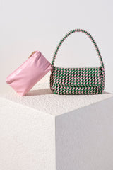 Add a pop of color to your summer wardrobe with Shiraleah's Monroe Shoulder Bag. Made from intricately handwoven PU, this multicolored purse is the perfect addition to any summer outfit. Its chic baguette style and single shoulder strap allow your to carry it easily from the beach to the restaurant. Pair with other items from Shiraleah to complete your look!
