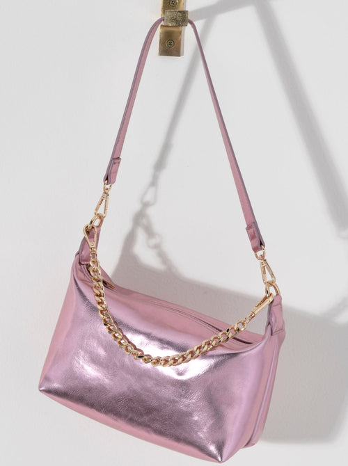 Make a statement this summer with Shiraleah's Maddie Shoulder Bag. Made from metallic PU, this shiny handbag is sure to turn heads. Add some versatility to your style by wearing with the detachable single shoulder strap or with the chic chain handle. Pair with other Shiraleah items to complete your look!
