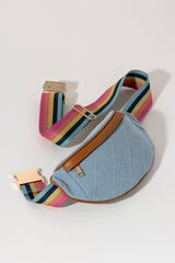 Keep everything you need right in reach with Shiraleah's Ali Belt Bag. Made from classic denim fabric with a rainbow colored belt strap, this bag can wrap around your waist or be slung fashionably across the body. The mix of colors with denim allows this bag to work with any of your favorite summer outfits. Pair with other items from Shiraleah to complete your look!