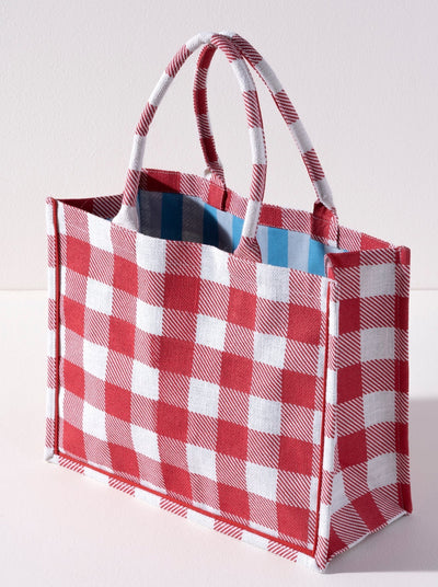 Take everything you need for your next picnic in Shiraleah's Dolly Tote. Made from durable jute fabric with a classic gingham design, this bag is the perfect addition to any summer outing. Its double shoulder straps make it as practical as it is fashionable. Pair with other items from Shiraleah's American Summer collection to complete your look!
