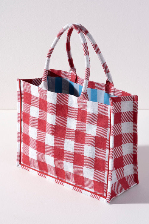 Take everything you need for your next picnic in Shiraleah's Dolly Tote. Made from durable jute fabric with a classic gingham design, this bag is the perfect addition to any summer outing. Its double shoulder straps make it as practical as it is fashionable. Pair with other items from Shiraleah's American Summer collection to complete your look!
