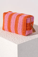Bring some brightness to the beach with you this summer in Shiraleah's striped Filomena Zip Pouch. Made of multicolored paper straw with a PVC inner lining, this cosmetic pouch is the perfect poolside companion. Pair with the matching Filomena Tote and other items from Shiraleah to complete your look!
