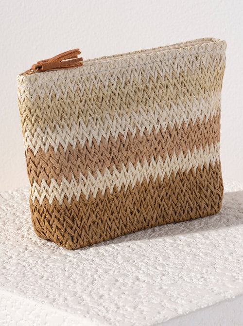 Bring some brightness to the beach with you this summer in Shiraleah's Formentera Zip Pouch. Made of paper straw, this cosmetic pouch is the perfect poolside companion. Pair with the matching Formentera Tote and other items from Shiraleah to complete your look!
