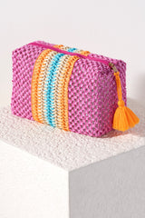 Bring some brightness to the beach with you this summer in Shiraleah's Remy Boxy Zip Pouch. Made of colorful paper straw with a PVC inner lining, this cosmetic pouch is the perfect poolside companion. Pair with the matching Remy Tote and other items from Shiraleah to complete your look!

