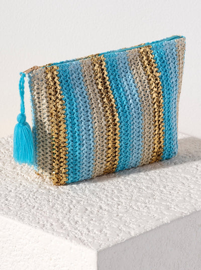 Bring some brightness to the beach with you this summer in Shiraleah's Delilah Zip Pouch. Made from colorful woven paper straw with bright gold accents and a tassle detail, this small cosmetic pouch is the perfect piece to travel with. Pair with the matching Delilah Tote and other items from Shiraleah to complete your look!
