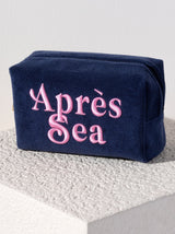 Carry all your odds and ends in style with Shiraleah's Sol "Apres Sea" Zip Pouch. Made from soft and absorbent cotton terry with a PVC inner lining, this pouch is a perfect companion for the poolside or on the go. Its trendy embroidery of the words "Apres Sea" makes it a fun addition to your summer wardrobe. Pair with other items from Shiraleah to complete your look!