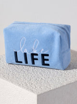 Carry all your odds and ends in style with Shiraleah's Sol "Lake Life" Zip Pouch. Made from soft and absorbent cotton terry with a PVC inner lining, this pouch is a perfect companion for the poolside or on the go. Its trendy embroidery of the words "Lake Life" makes it a fun addition to your summer wardrobe. Pair with other items from Shiraleah to complete your look!