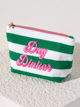 Carry all your odds and ends in style with Shiraleah's "Day Dinker" Zip Pouch. Made from soft and absorbent cotton terry, this durable pouch is your perfect courtside companion. With its trendy pickleball-themed embroidery, this small and practical pouch as a great gift for your favorite pickleballer. Pair with other items from Shiraleah to complete your look!
