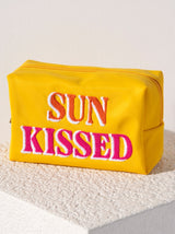 Carry all your odds and ends in style with Shiraleah's "Sun Kissed" Zip Pouch. Made of durable polyester in a vibrant yellow, this rectangular case can fit a smaller zip pouch and offers lots of interior room for storage. The trendy toothbrush embroidery spells the words "Sun Kissed" in bright orange and pink lettering. Pair with other items from Shiraleah to complete your look!
