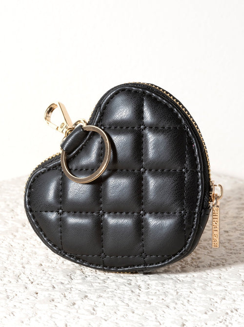 Add a touch of love to any handbag with Shiraleah's Clip-on Sweetheart Zip Pouch. This compact pouch can carry your smallest essentials and easily attaches by key ring or clasp hook. Pair with other items from Shiraleah's Sweetheart collection to complete your look!
