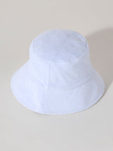 Keep your head cool and dry this summer with Shiraleah's Sol Bucket Hat. Made from soft and absorbent cotton terry, this hat is the perfect poolside companion. Its crisp white color matches the rest of Shiraleah's Sol collection. Pair with other items to complete your look!

