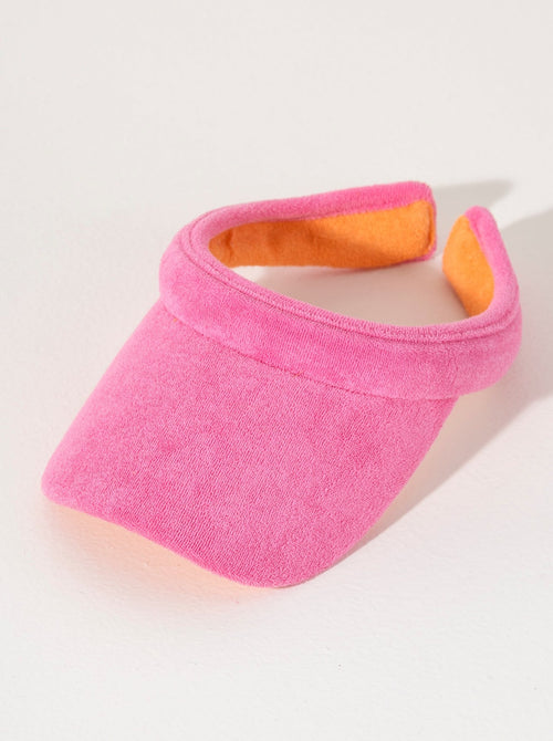 Keep your face shaded and dry this summer with Shiraleah's Sol Visor. Made from soft and absorbent cotton terry, this practical accessory is the perfect poolside companion. Its vibrant pink color matches the rest of Shiraleah's Sol collection. Pair with other items from Shiraleah's Poolside collection to complete your look!
