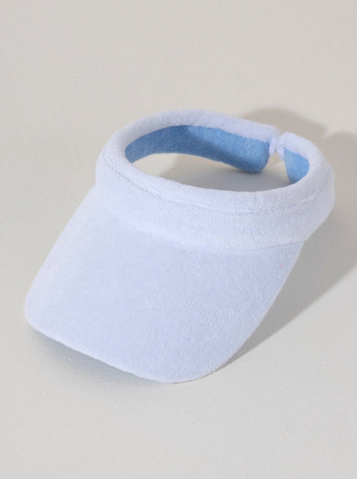 Keep your face shaded and dry this summer with Shiraleah's Sol Visor. Made from soft and absorbent cotton terry, this practical accessory is the perfect poolside companion. Its crisp white color matches the rest of Shiraleah's Sol collection. Pair with other items from Shiraleah's Poolside collection to complete your look!
