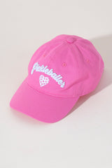 Stand out on the court with Shiraleah's "Pickleballer" Hat. This bright bubblegum pink ball cap is the perfect balance between sporty and trendy with its adorable embroidered pickleball heart. Pair with other items from Shiraleah's Pickleball collection to complete your look!
