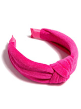 Add a trendy touch to your summer hairstyles with Shiraleah's Terry Knotted Headband. Made from soft and absorbent cotton terry, this versatile hair piece can be worn out on the town or by the poolside. Coming in eight vibrant shades, these colorful headbands match items from Shiraleah's Sol collection. Pair with other items from Shiraleah to complete your look!
