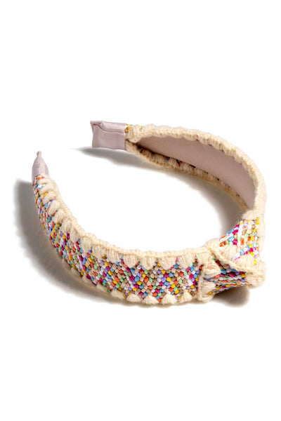 Add an elevated touch to your summer hairstyles with Shiraleah's Knotted Headband. With its bright colors and top knot detail, this chic and trendy headband will be your new favorite summer accessory. Pair with other items from Shiraleah to complete your look!

