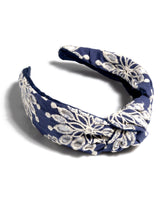 Add an elevated touch to your summer hairstyles with Shiraleah's Chifley Knotted Headband. With its patterned fabric and top knot detail, this chic and trendy headband will be your new favorite summer accessory. Pair with other items from Shiraleah to complete your look!
