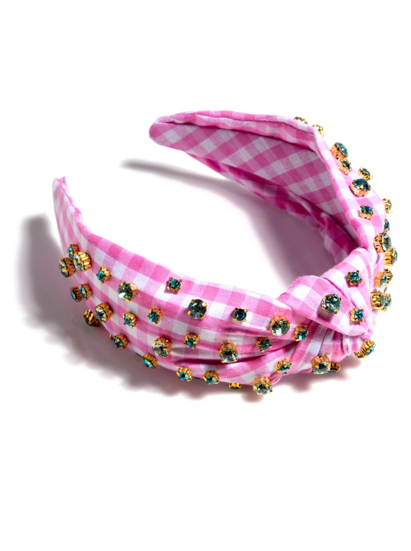 Add an elevated touch to your summer hairstyles with Shiraleah's Embellished Gingham Knotted Headband. With its classic gingham design and multicolored rhinestone details, this chic and feminine headband will be your new favorite summer accessory. Pair with other items from Shiraleah to complete your look!
