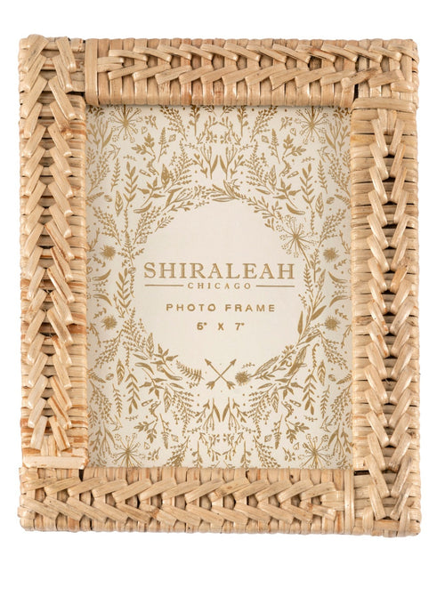 Put your favorite memories on display with Shiraleah’s Portofino Woven Picture Frame. With a natural braided bamboo texture, this 5x7 frame adds some fun boho flair to your table top décor. The easel back stand allows the frame to sit easily on any flat surface display with a strong glass barrier to protect your artwork. Mix and match with other Shiraleah frames to complete your home gallery's look!
