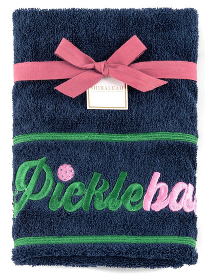 Sweat it up in style on the court with Shiraleah's "Pickleballer" towel. This lightweight cotton hand towel is the perfect size to bring on any athletic outing, and the unique embroidered design makes it a great gift for the pickleballer in your life. Pair with other items from Shiraleah's Pickleball collection to complete your look!